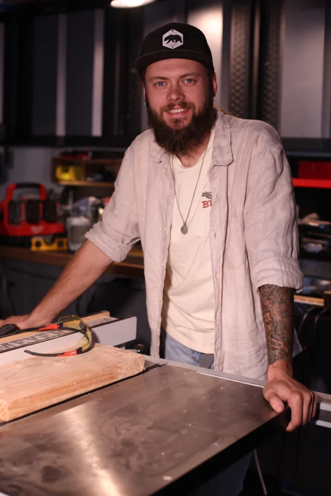 Alex Titov at his workbench in the Home Repairman workshop