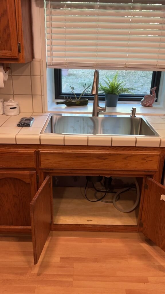 Sink cabinet with the replacement bottom panel fitted