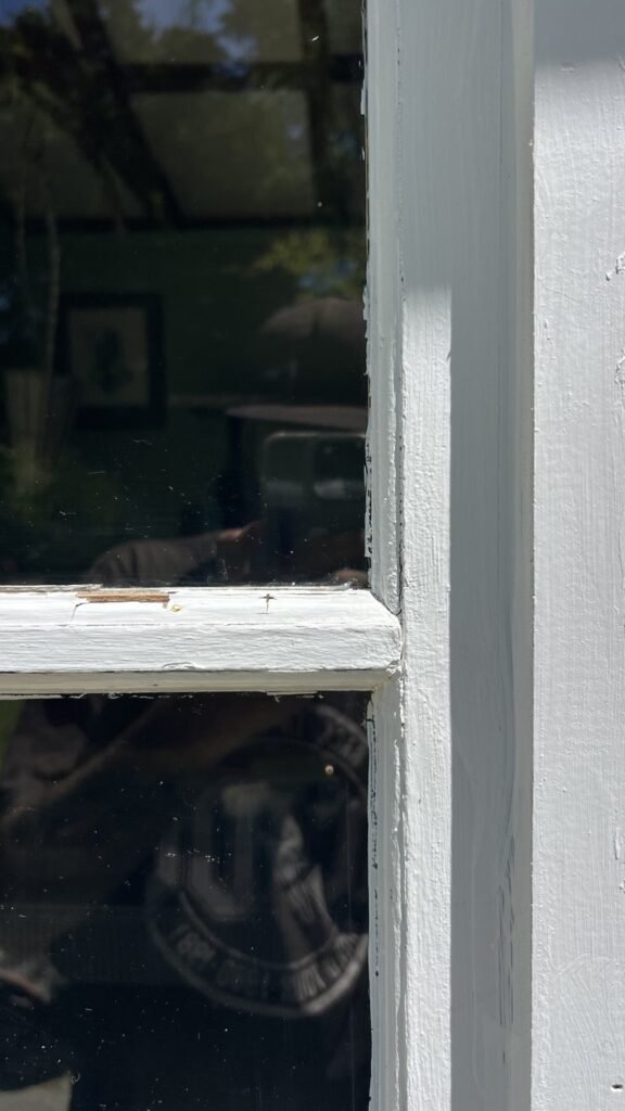 Original wood window detail before the work